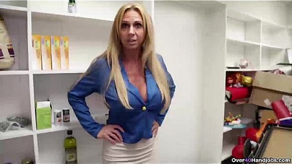 over40-Horny milf strokes a young cock