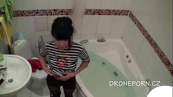 Sexy Asian girl in the bathroom  