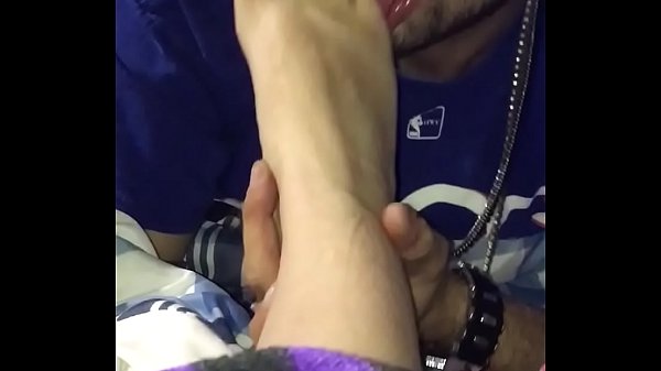 Licking her feet before bed  