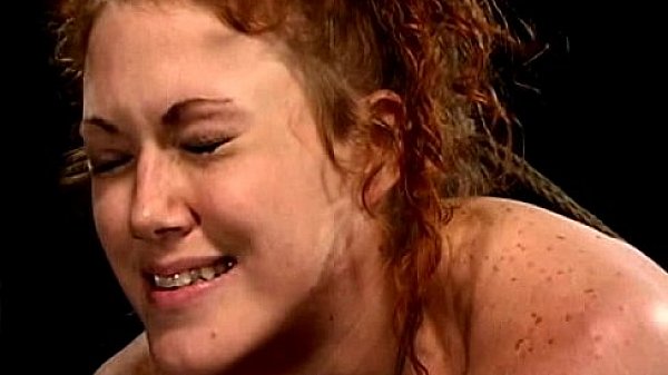 Tied redhead sucks cock and eating ass