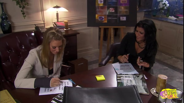 Two very attractive blond women are engaging in delightful lesbian activities with a vintage aesthetic