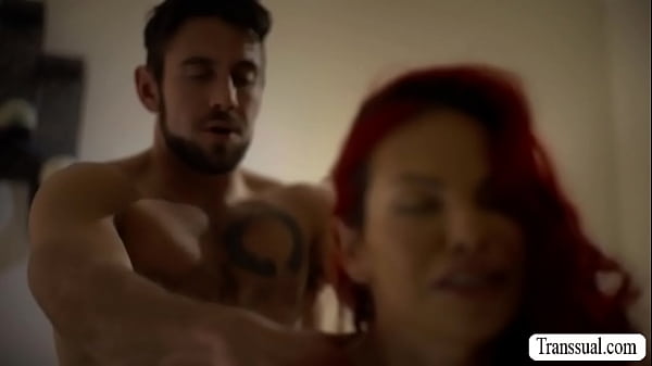 Redhead Trans Foxxy and his stepson are on the bed kissing each other.After that,she pulls out stepsons cock and sucks it passionately.In return,her stepson bareback fucks her tight wet asshole so deep and hard.