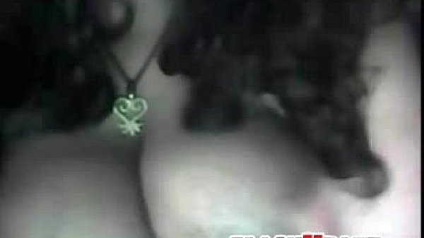 Black babe plays with her huge breasts