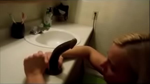 amateur sucking big dildo