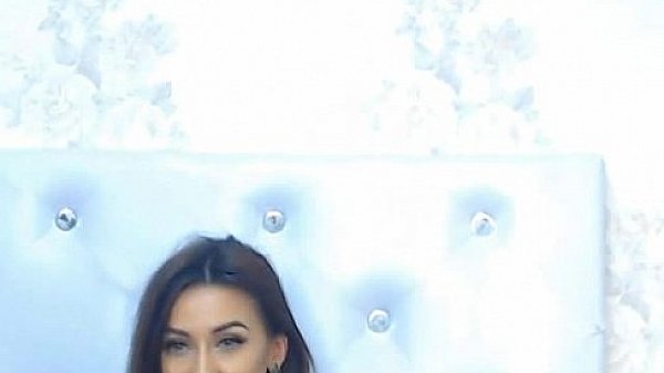 Hot brunette masturbates with dildo on cam