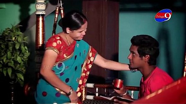 Mahi aunty tempting to young boy in her house - YouTube.MP4