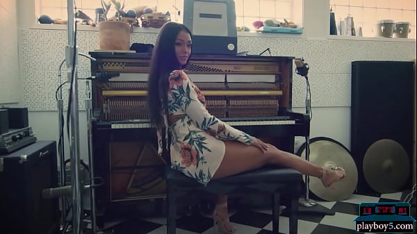 Big ass black Playmate gets naked in a recording studio and looks smokin hot 