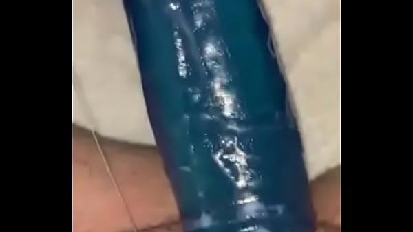 Wife fucks herself with big blue