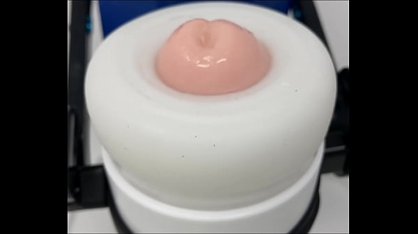 Sex robot doing a demo of some sex toys