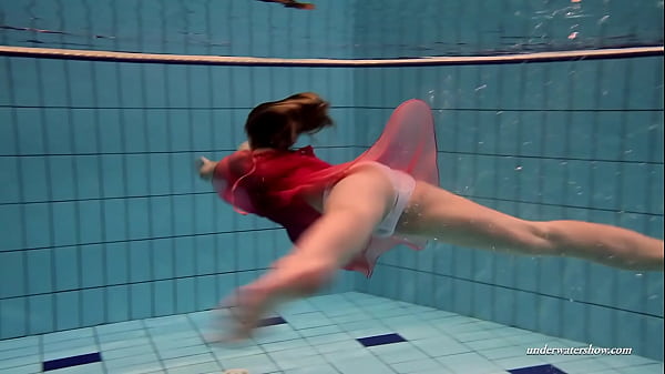 Swimming beauty totally naked and lonely in the pool