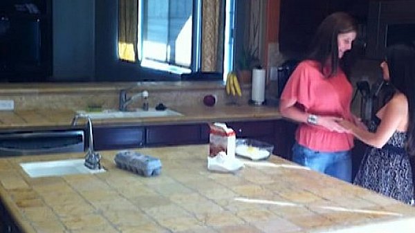 Horny milf eats teen pussy in the kitchen