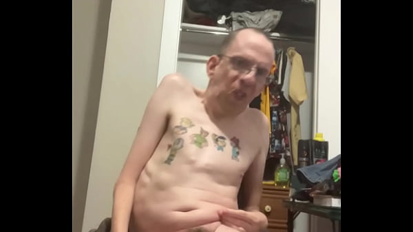 Disabled gay man playing with his cock and nipples in his wheelchair  