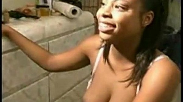 Ebony on her knees sucking and balls stroking