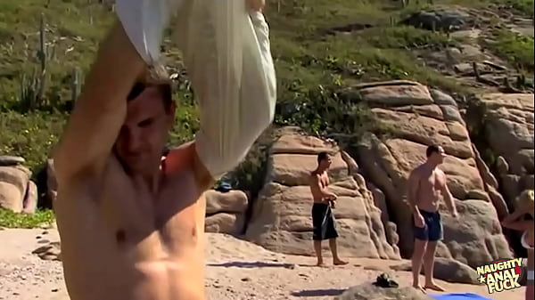 A woman with blonde hair and an attractive physique engages in sexual activity with two men in a pub in the absence of any witnesses 