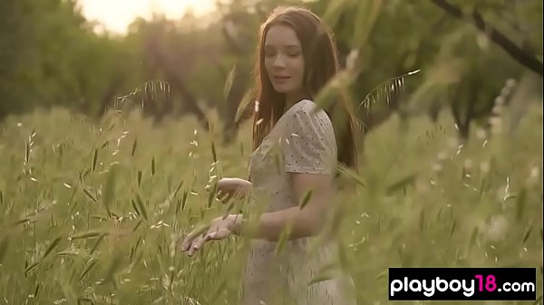 Stunning busty chick shows everything she has at a meadow