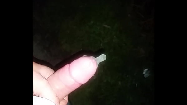 Filling a condom with piss