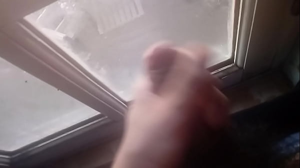 Cumming at the window