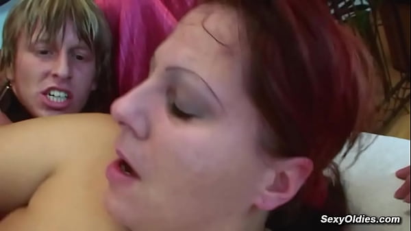 BBW MILF Vendy in black boots sucks and jerks big cock to blond guy on a leash Denis Reed then he sucks her big tits and fucks her plump pussy 