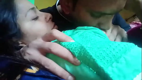 Kissing and pressing boobs of girlfriend