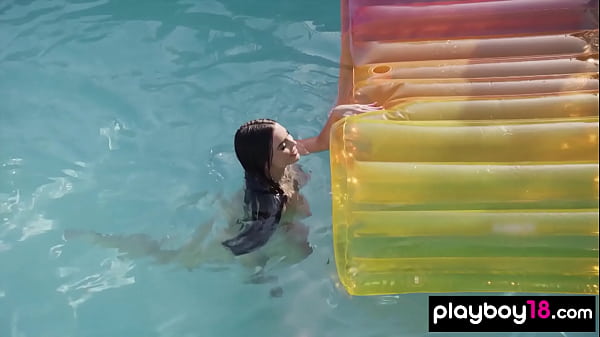 Busty American beauty reveals her pierced nipples outdoor