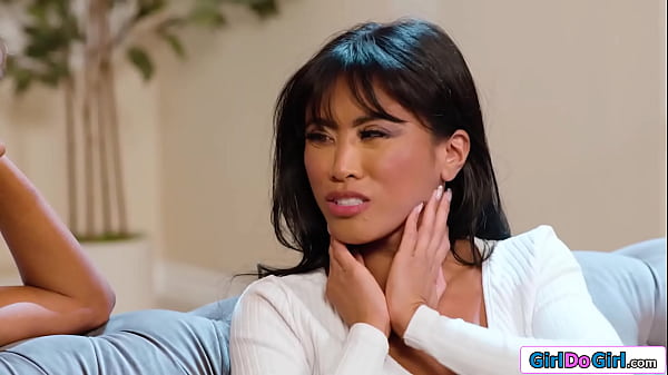 Ebony Kylie LeBeau gives her busty asian gf Ember Snow a facial massage which leads to a boobs massage.The lesbian are turned on and lick pussy