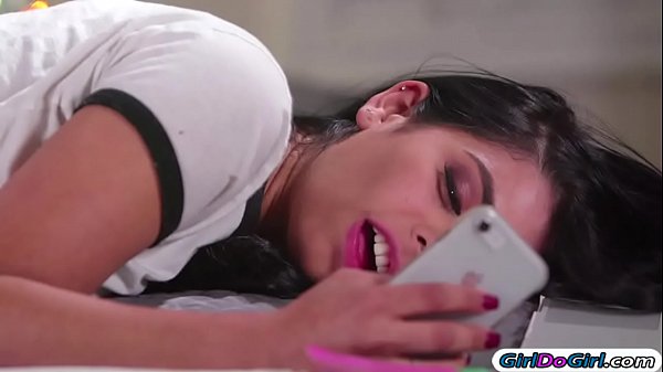 Gina Valentina rubs on a lingerie pic of her classmate Karlee Grey and accidently clicks like.Karlee sees it and wants some fun and invites her over.She teases her and they kiss.Gina makes her squirt first before licking her and facesits her 