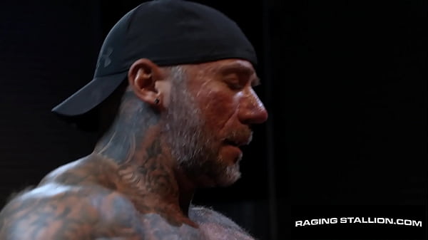 The girthy meat of Masculine Jason is filling up Bruce Jones' mouth as the inked-up muscle daddy looks down at his horny cocksucker.