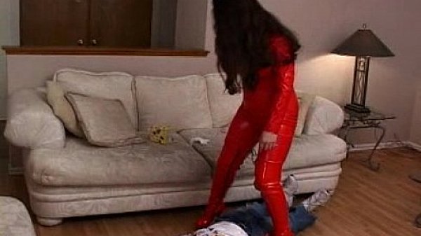 femdom in full red latex catsuit facesitting a poor guy 