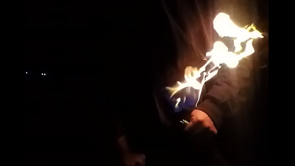 Stroking On Fire at Night