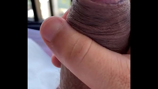 While in hawaii my uncut thick cock cums a lot while I enjoy stroking it alone in open air