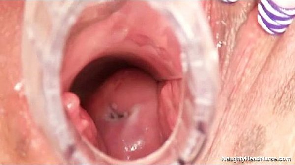 Aged amateur mom wears glasses and latex uniform