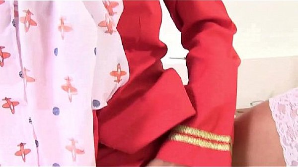 Sexy stewardess plays with her pee