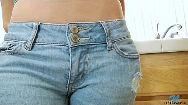 Brooke Van Buran strips and then pleases her hard clit with her favorite vibrator on the kitchen counter.  