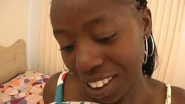 Black chick strokes a big cock on bed