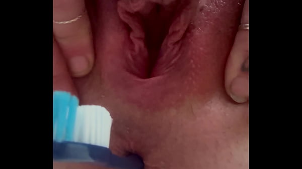 Shoving a toothbrush up her butt