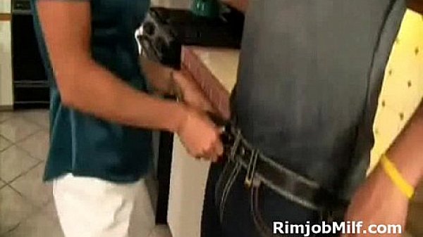 Busty brunette MILF loves the taste of ass when she gives a rimjob