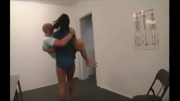 Hot Brunette lift and carry A Guy  