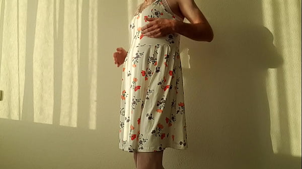 Man wear romantic dress and Pink womans underwear. 