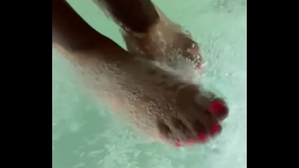 Playing with my feet in water  