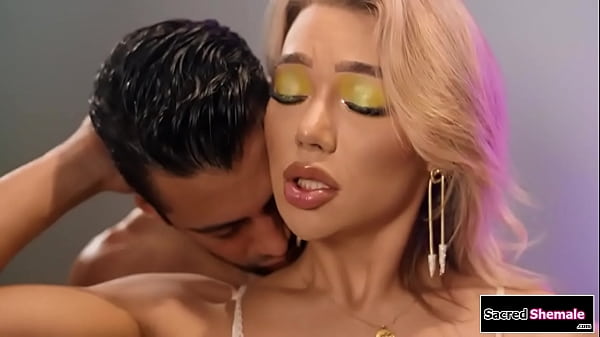 Blonde trans Emma Rose has a wet dream with a guy and he sucks the tgirls small tits.The shemale facefucks him and they 69.Then the ts is barebacked  