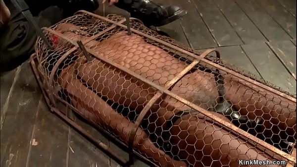 Hot ebony slave slut is shackled in back bend device bondage and gets whipped then in small metal cage gets intense pussy vibrated by master  