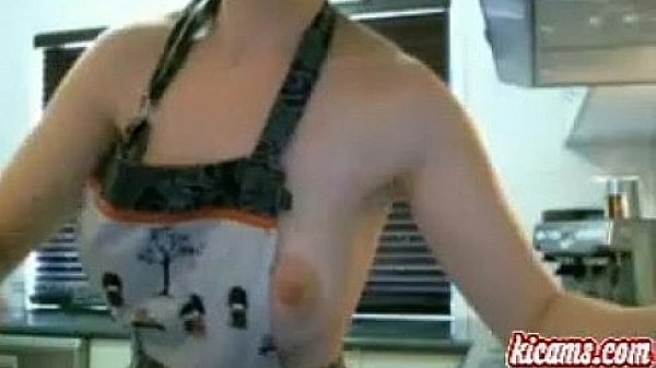 Sexy busty brunette MILF has fun in the kitchen