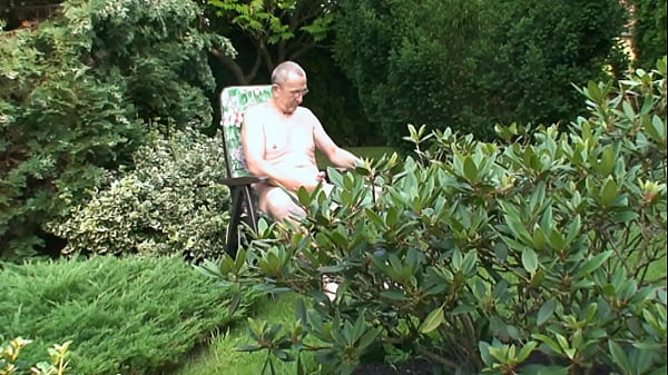 Nudeboy is wanking in the garden 11