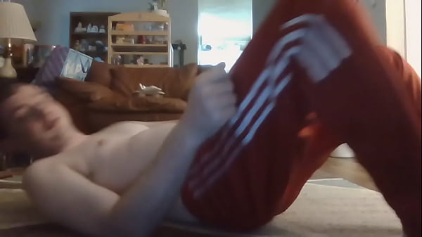 Young Man touching his body