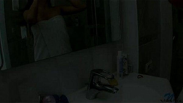 Yudita showers and masturbates her naughty pussy when she can't have cock. 