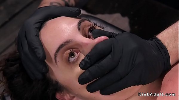 Brunette Milf slave spanked by master in dungeon