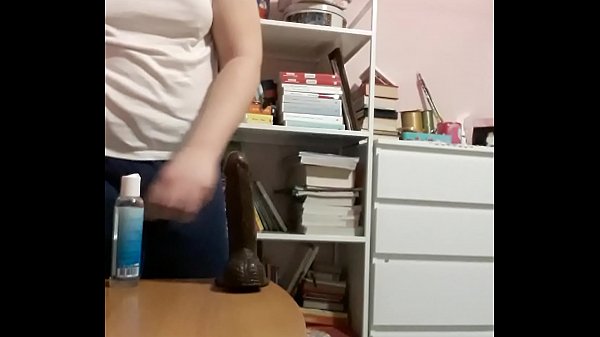 Chubby boy loves his black dildo  