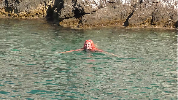 Blue water and a naked girl!