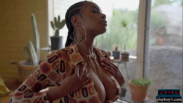 Huge boobs black babe shows off her amazing body with hairy pussy for Playboy 