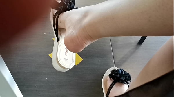 Flip flops in crowded public place